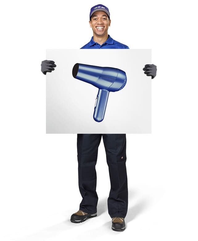 1-800-GOT-JUNK? Truck Team Member holding an image of a hair dryer