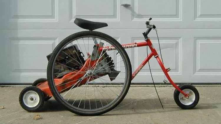 Wacky tricycle with large wheels